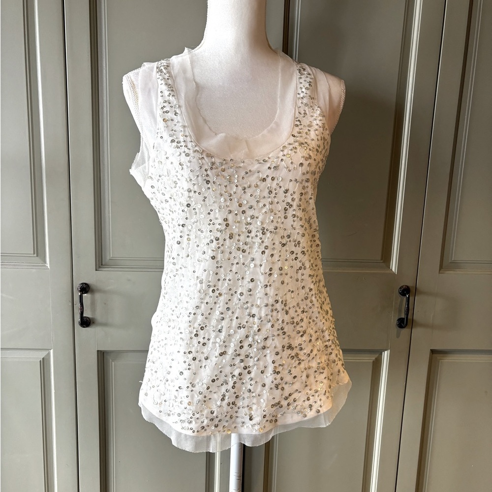 Sleeveless white and ivory mesh top with sequins by American Eagle outfitters.